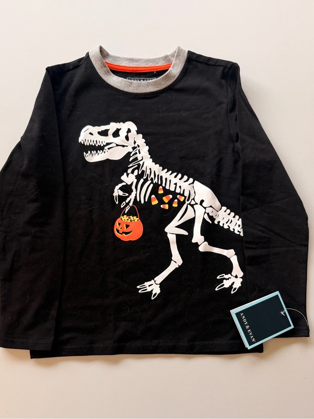 Andy & Evan Black Long-Sleeve Tee with White Dino Skeleton and Orange Pumpkin